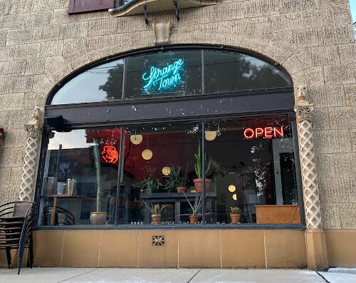 Come visit  and enjoy amazing food at Strange Town